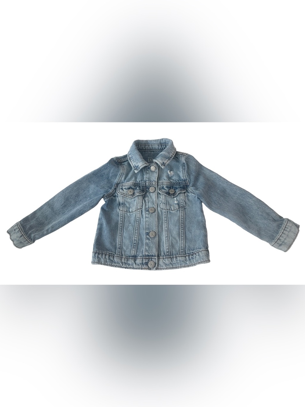 Gap girl’s Icon Denim Jacket. with distressed detailing at the chest.  Size 4T.